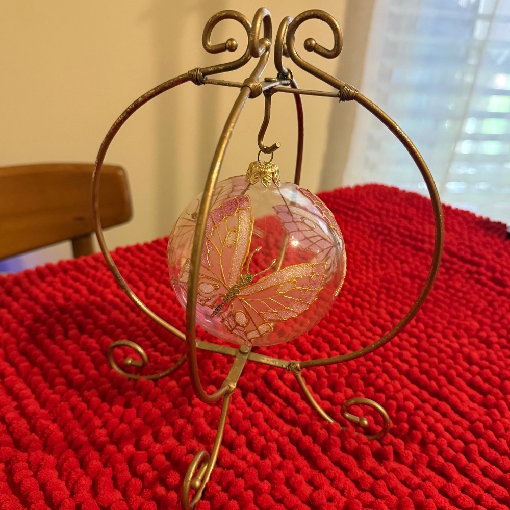 Ornament, Clear plastic with beautiful pink & gold butterflies, stand included.